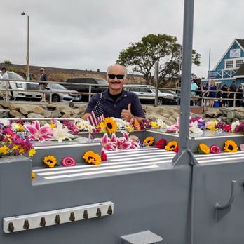 Seaside Flowers - Capt'n Joe with the display of flowers - Florists Near Me - Oceanside, California Seaside Flowers - Capt'n Joe with the display of flowers - Florists Near Me - Oceanside, California