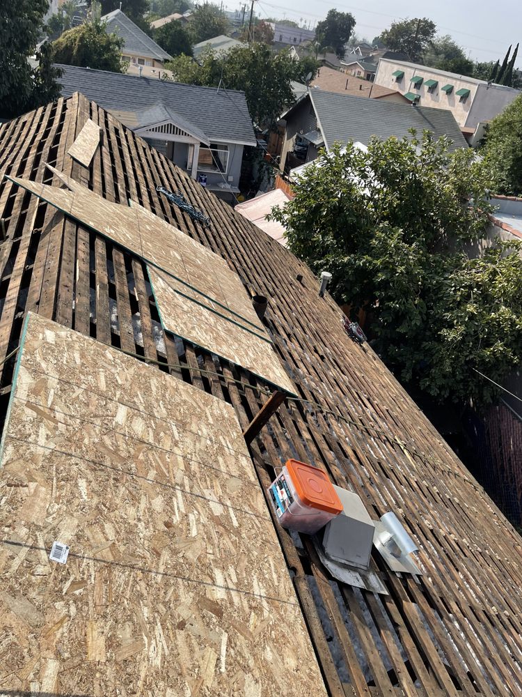 Slide of Oscar Roofing  services