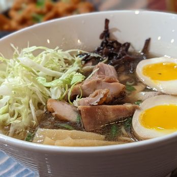 Baka Umai - a bowl of food on a table - Noodles Near Me - Portland, Oregon Baka Umai - a bowl of food on a table - Noodles Near Me - Portland, Oregon