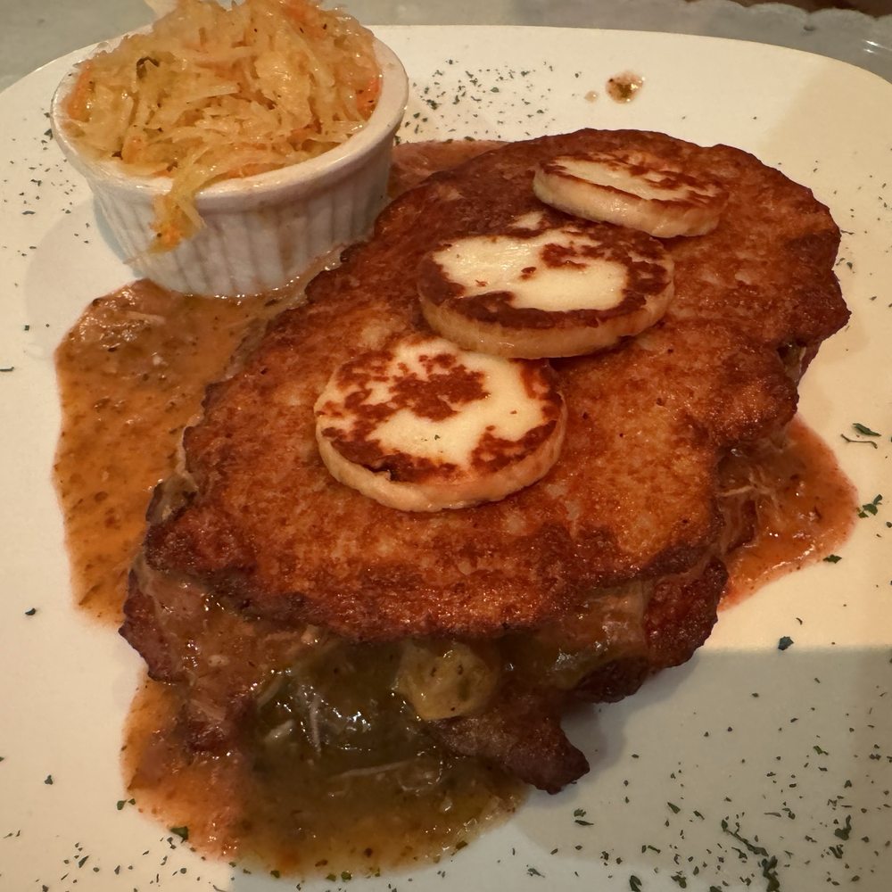 Tatra Haus - Potato pancake with goulash is another hit! - Polish Near Me - Wallington, New Jersey Tatra Haus - Potato pancake with goulash is another hit! - Polish Near Me - Wallington, New Jersey