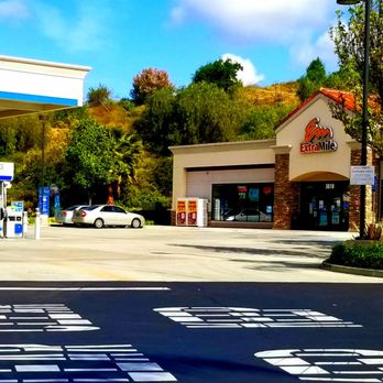 Chevron - a gas station with a white car parked in front of it - Gas Stations Near Me - Chino Hills, California Chevron - a gas station with a white car parked in front of it - Gas Stations Near Me - Chino Hills, California