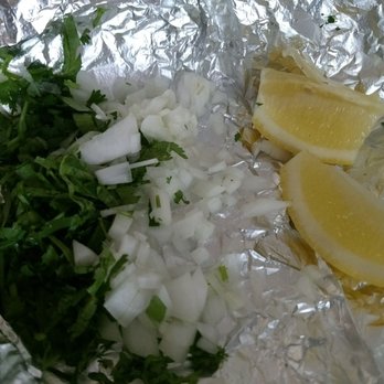 El Huarache Loco - Cilantro, onion, and lemon - we had 2 of these foil wrapped and was enough for our 17 tacos - Mexican Near Me - Delano, California