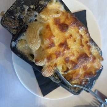 Oyster And Chop - Mac and cheese w provolone and truffle oil - Seafood Near Me - Auckland, AUK Oyster And Chop - Mac and cheese w provolone and truffle oil - Seafood Near Me - Auckland, AUK