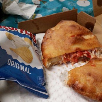 Greek's Pizzeria - a half eaten pizza - Italian Near Me - Lebanon, Indiana Greek's Pizzeria - a half eaten pizza - Italian Near Me - Lebanon, Indiana