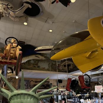 Buck's - a statue of liberty and a model airplane - American Near Me - Woodside, California Buck's - a statue of liberty and a model airplane - American Near Me - Woodside, California