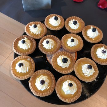 Foodz Catering - Yellow Ledbetter tarts displayed on old albums with our theme! Personalized touch! - Caterers Near Me - Seattle, Washington Foodz Catering - Yellow Ledbetter tarts displayed on old albums with our theme! Personalized touch! - Caterers Near Me - Seattle, Washington
