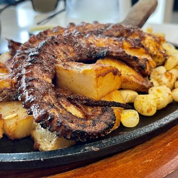 Mares Real Peruvian Cuisine - Grilled octopus over Peruvian corn and potatoes - Peruvian Near Me - Winter Park, Florida