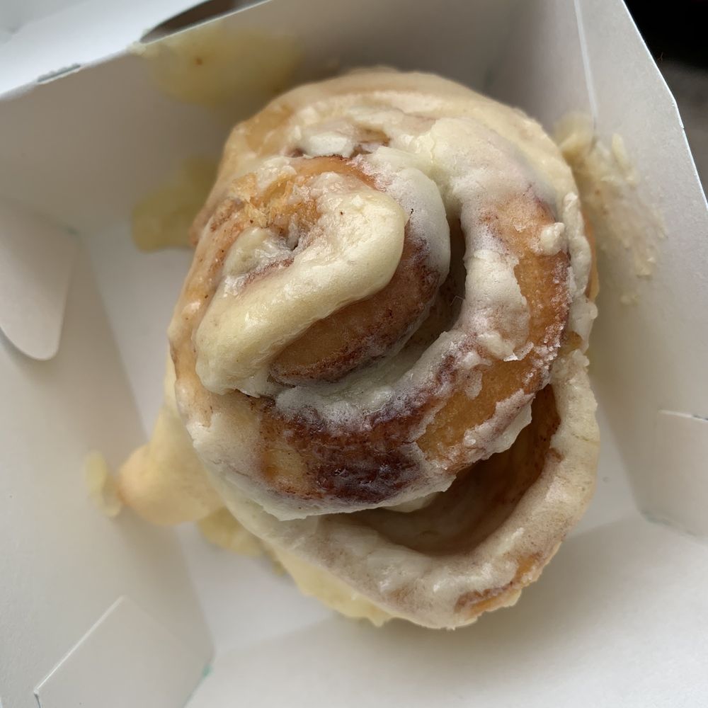 a cinnamon roll in a box