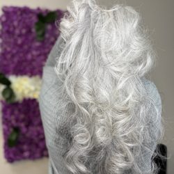 Nelly's Beauty Paradise - Embracing the beauty of graying hair with vibrant, age-defying color and style.