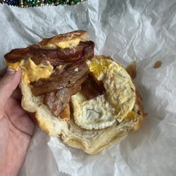 Iowa Donuts - Eggs, bacon and cheese Croissant sandwich