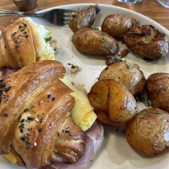 Prep & Pastry on Grant - Everything Croissant sandwich with crispy breakfast potatoes. Light on the everything seasoning and heavy on the non-crispy potatoes. - Breakfast & Brunch Near Me - Tucson, Arizona