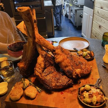 FAFO Kitchen - OMG!!! Perfectly cooked tomahawk steaks, roasted heads of garlic, bacon, infused, brussels sprouts, and harissa garlic, mashed potatoes - New American Near Me - Silverdale, Washington