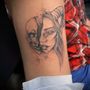 Photo of Black & Blue Tattoo