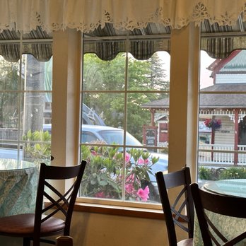 La Conner Thai Garden Restaurant - a table and chairs - Thai Near Me - La Conner, Washington La Conner Thai Garden Restaurant - a table and chairs - Thai Near Me - La Conner, Washington
