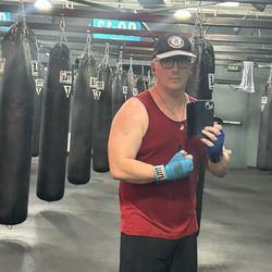 TITLE Boxing Club - Heavy bags at Title boxing with hand wraps for boxing