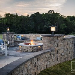 The Outdoor Living Company - We installed this fire pit area that made the cover of the 2023 Belgard Catalog.