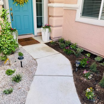 Las Vegas Backyards - Drought resistant and low maintenance plants on the left, flower garden on the right - Landscaping Near Me - Las Vegas, Nevada