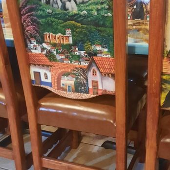 El Rancho - a dining room table with a painting on it - Mexican Near Me - Poquoson, Virginia El Rancho - a dining room table with a painting on it - Mexican Near Me - Poquoson, Virginia
