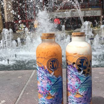 Roasting Water - Left: Thai iced tea w/ boba Right l: Thai iced tea smoothies with whip cream and boba - Bubble Tea Near Me - Long Beach, California