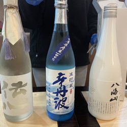 Dojo - Selection of sake! The one on the left is made from snow, middle one is natural spring, and the right is volcanic I think. May be wrong.
