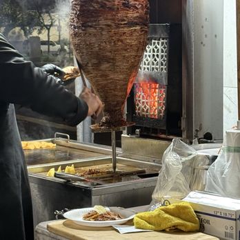 Tacos Mando - the pastor being freshly sliced (yummmmmm) - Mexican Near Me - Fresno, California Tacos Mando - the pastor being freshly sliced (yummmmmm) - Mexican Near Me - Fresno, California
