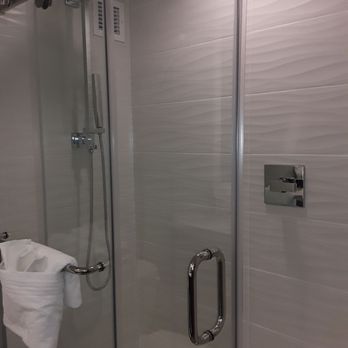 Renaissance Indianapolis North Hotel - Glass enclosed shower with dope removable showerhead to massage yourself - Hotels Near Me - Carmel, Indiana Renaissance Indianapolis North Hotel - Glass enclosed shower with dope removable showerhead to massage yourself - Hotels Near Me - Carmel, Indiana