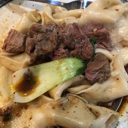 Xi'an biangbiang noodles in chili sauce with beef