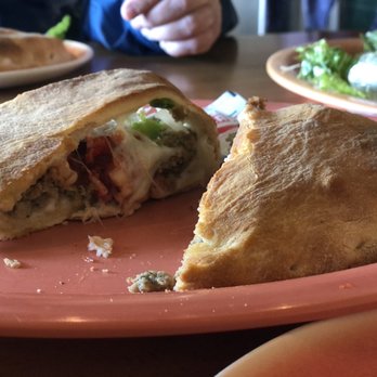 Iolis' Pizzeria - Calzone large enough for 4 - Italian Near Me - Carmel, California Iolis' Pizzeria - Calzone large enough for 4 - Italian Near Me - Carmel, California