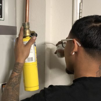 A's Plumbing - Kevyn installing the new drain line. - Plumbing Near Me A's Plumbing - Kevyn installing the new drain line. - Plumbing Near Me