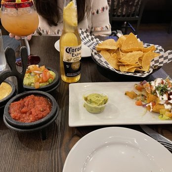 Taco N Tequila - Taquitos and three amigo dipping platter. - Mexican Near Me - Niagara Falls, Ontario Taco N Tequila - Taquitos and three amigo dipping platter. - Mexican Near Me - Niagara Falls, Ontario