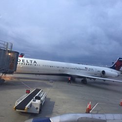 Delta Air Lines - Early morning flights, cloudy sky; thank goodness for short flights!