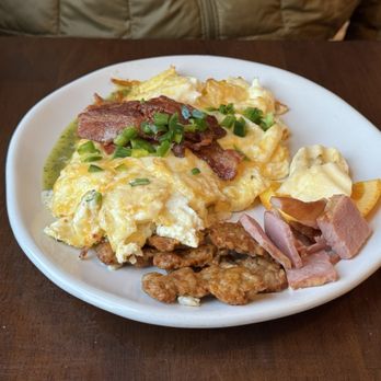 Faye's Cafe - Protein assortment, fruit, and soft scramble eggs with cilantro lime sauce - Cafes Near Me - Livingston, Montana