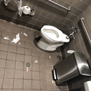 Which Wich - a toilet and trash can in a public restroom - Fast Food Near Me - Albuquerque, New Mexico