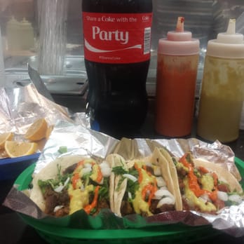 La Moreliana - a plate of tacos and a soda - Mexican Near Me - Austin, Texas