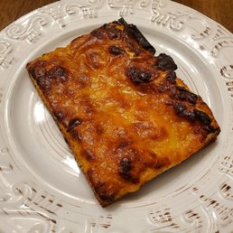 Oven-reheated cheese pizza (10 mins, 450F)