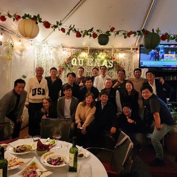 Quenas Restaurant - a group of people posing for a picture - Peruvian Near Me - Harrison, New York