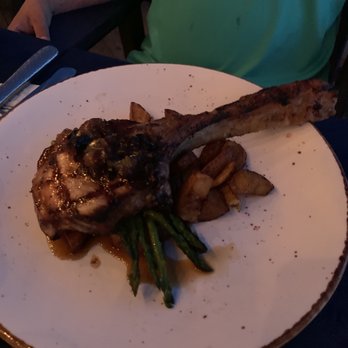 NC Coast Grill & Bar - Tomahawk Chop - bone-in pork chops, quick fried potatoes, garlic grilled veggies, jalapeño bacon jam - New American Near Me - Kitty Hawk, North Carolina NC Coast Grill & Bar - Tomahawk Chop - bone-in pork chops, quick fried potatoes, garlic grilled veggies, jalapeño bacon jam - New American Near Me - Kitty Hawk, North Carolina
