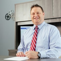 Clinton Sheets, MD - Dr. Clinton Sheets at his desk
