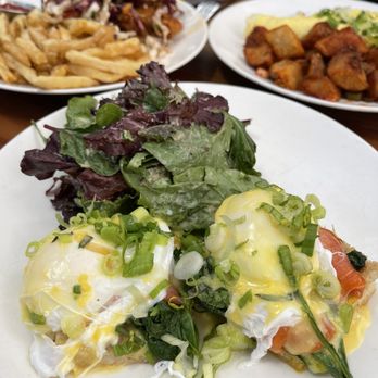 Fable - Trout eggs benedict in front, fried chicken sando in back left, omelette in back right - New American Near Me - San Francisco, California Fable - Trout eggs benedict in front, fried chicken sando in back left, omelette in back right - New American Near Me - San Francisco, California