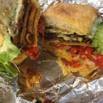 Ria's Bistro  - Baked breaded eggplant with pesto, roasted reds, provolone and lettuce. Sooo good! - Delis Near Me - Albany, New York