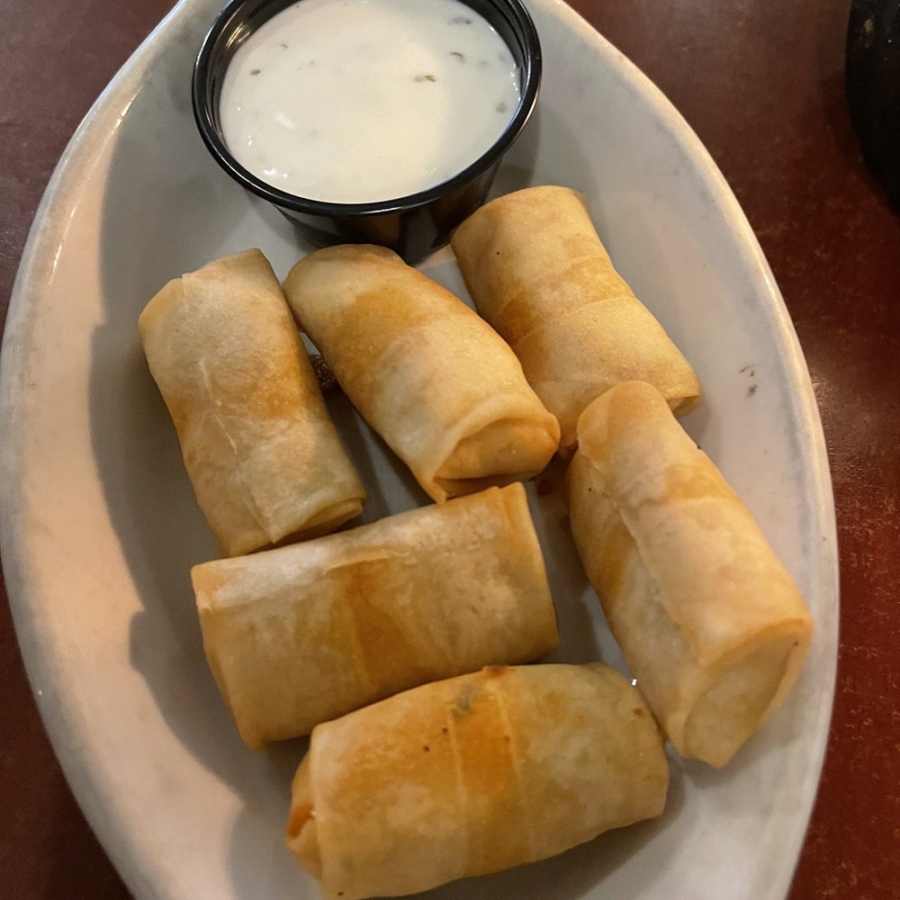 Buffalo Chicken Spring Rolls. Mushy and not allot of flavor. No chili sauce Buffalo Chicken Spring Rolls. Mushy and not allot of flavor. No chili sauce