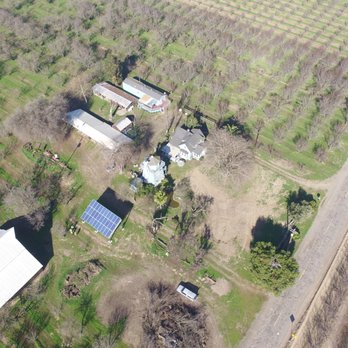 Extreme Solar Solutions - Raised Ground Mount Carport Solar Array Providing clean electricity to the entire orchard! Including Electric Vehicles - Solar Installation Near Me - Atwater, California Extreme Solar Solutions - Raised Ground Mount Carport Solar Array Providing clean electricity to the entire orchard! Including Electric Vehicles - Solar Installation Near Me - Atwater, California