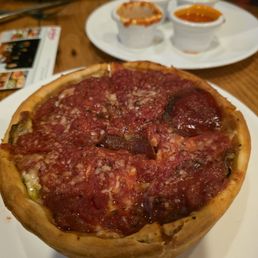 Classic deep dish personal size (pepperoni, onions, mushrooms, and green onions)