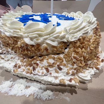 Gallo’s Bakery - a cake with white frosting and blue icing - Donuts Near Me - Marlton, New Jersey