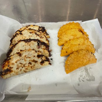Mariscos El Compa Ivan - a plate of food - Food Delivery Services Near Me - Long Beach, California