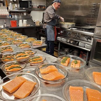 Bacquet's Restaurant - Chef Bacquet preparing family meal take away during covid19 - a model for safe kitchen prep any time (thx Michele B for photo) - French Near Me - Eagle, Idaho Bacquet's Restaurant - Chef Bacquet preparing family meal take away during covid19 - a model for safe kitchen prep any time (thx Michele B for photo) - French Near Me - Eagle, Idaho