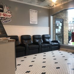 Grand River - Waiting area with price list above.
