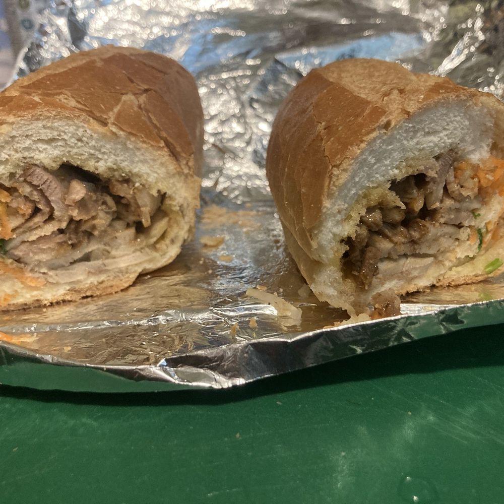Traditional banh mi cut in half. Pretty good portion and nice crispiness to the bread! Traditional banh mi cut in half. Pretty good portion and nice crispiness to the bread!