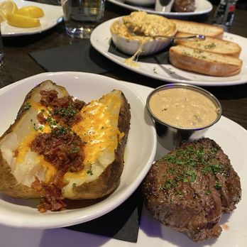 Manning’s Steaks And Spirits - Filet, loaded baked potato and Gruyère mushroom sauce.Yes, please! - Steakhouses Near Me - Littleton, Colorado