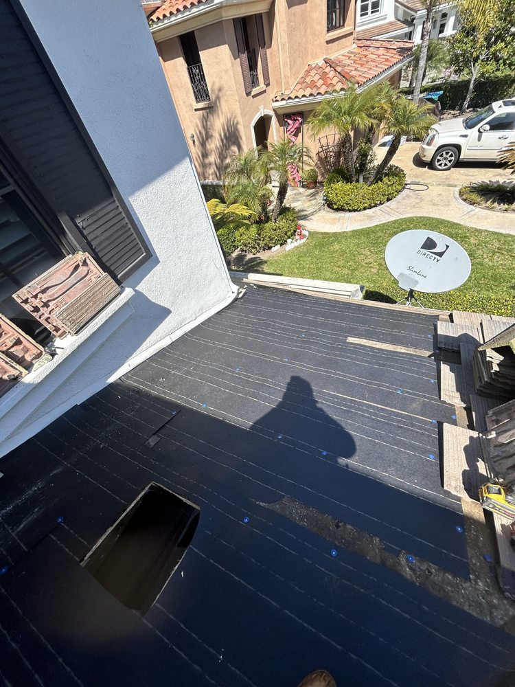 Slide of Early Roofing Rosendo